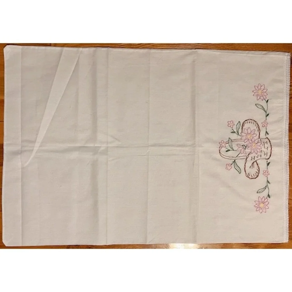 Vintage pair of pillowcases, basket and floral embroidery